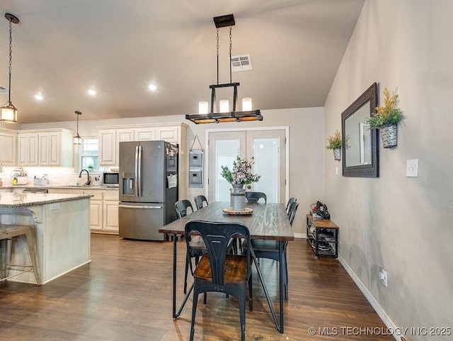 23997 County Road 1475th Loop, Ada, OK 74820 - dining space with dark wood-type flooring, recessed lighting, and french doors