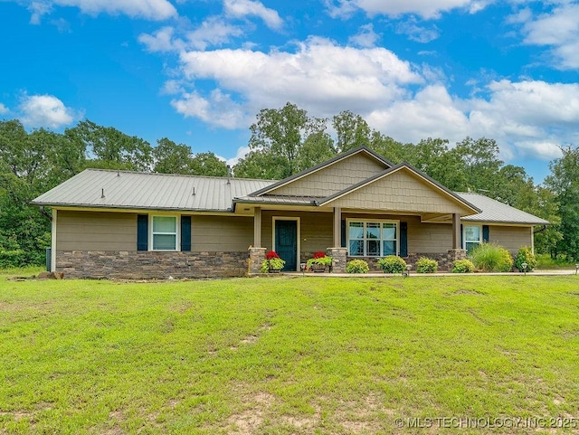 23997 County Road 1475th Loop, Ada, OK 74820 - craftsman inspired home featuring stone siding and a front yard