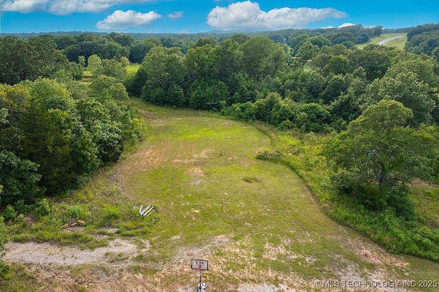 23997 County Road 1475th Loop, Ada, OK 74820 - aerial view of property's location featuring a heavily wooded area