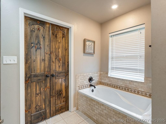 23997 County Road 1475th Loop, Ada, OK 74820 - bathroom featuring tile patterned flooring and a bath