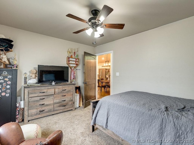 23997 County Road 1475th Loop, Ada, OK 74820 - carpeted bedroom with ceiling fan