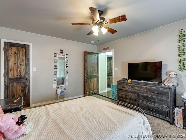 23997 County Road 1475th Loop, Ada, OK 74820 - carpeted bedroom with a ceiling fan and baseboards