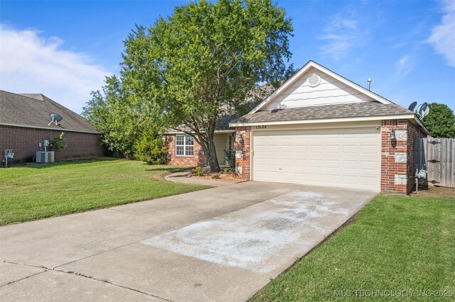 13124 N 133rd E Ave, Collinsville, OK 74021 - view of front of house with brick siding, a garage, concrete driveway, and roof with shingles