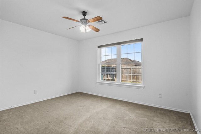 13124 N 133rd E Ave, Collinsville, OK 74021 - spare room featuring carpet floors and ceiling fan