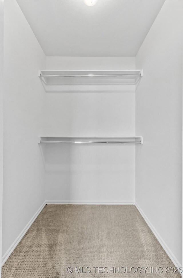 13124 N 133rd E Ave, Collinsville, OK 74021 - spacious closet featuring carpet floors