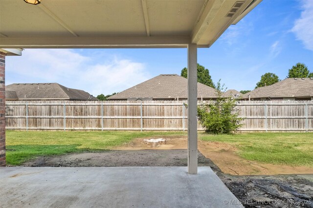 13124 N 133rd E Ave, Collinsville, OK 74021 - fenced backyard with a patio area