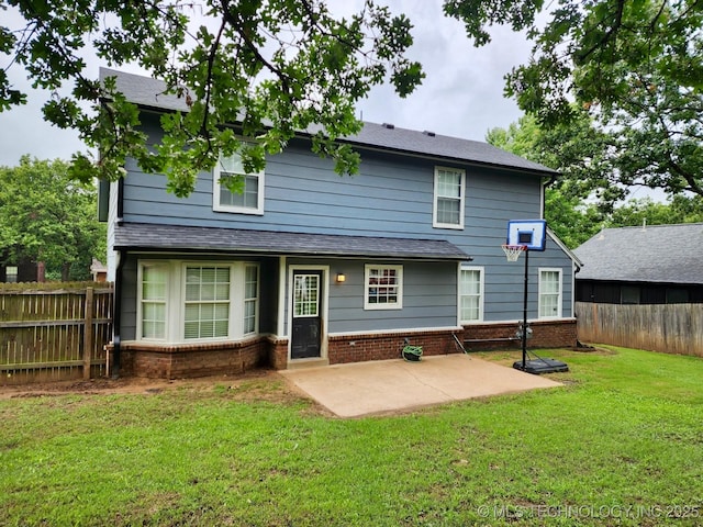 3617 S 74th W Ct, Tulsa, OK 74107 - back of property with a patio area, a fenced backyard, and brick siding