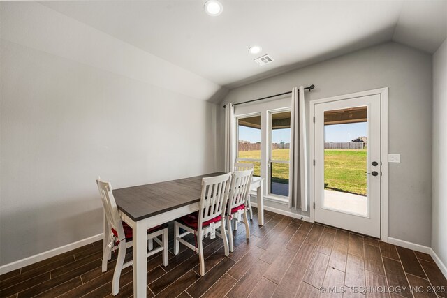 30109 Gale Ave, Inola, OK 74036 - dining area featuring vaulted ceiling, dark wood-type flooring, and recessed lighting