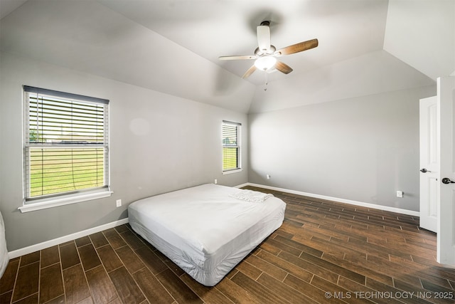 30109 Gale Ave, Inola, OK 74036 - bedroom with dark wood-style flooring, lofted ceiling, and ceiling fan