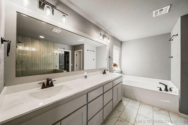 30109 Gale Ave, Inola, OK 74036 - bathroom with double vanity, a bath, marble look tiles, and a shower