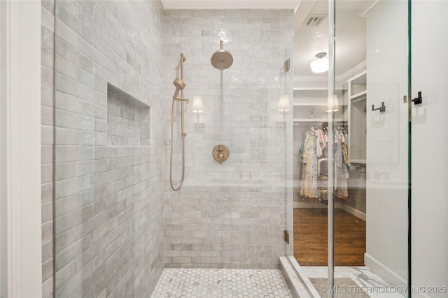 1617 S St Louis Ave, Tulsa, OK 74120 - bathroom featuring tiled shower and crown molding