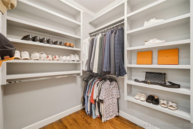 1617 S St Louis Ave, Tulsa, OK 74120 - walk in closet featuring wood finished floors