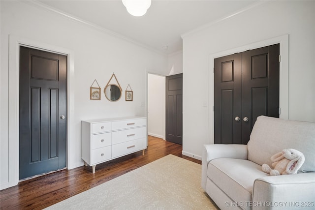 1617 S St Louis Ave, Tulsa, OK 74120 - sitting room with dark wood-type flooring and crown molding