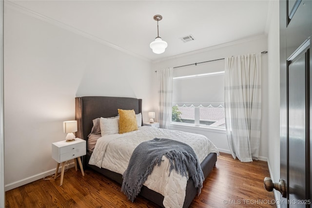 1617 S St Louis Ave, Tulsa, OK 74120 - bedroom featuring wood finished floors and crown molding