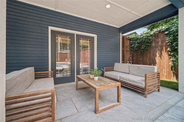1617 S St Louis Ave, Tulsa, OK 74120 - view of patio featuring an outdoor hangout area and french doors