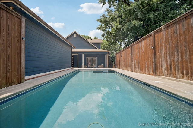 1617 S St Louis Ave, Tulsa, OK 74120 - view of swimming pool with french doors and a pool with connected hot tub