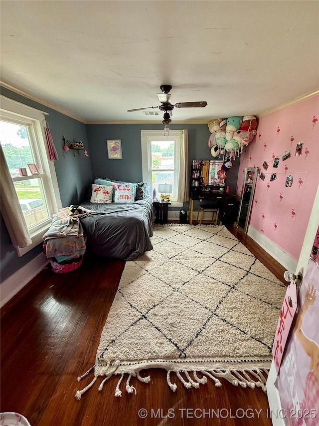 416 E 7th St, Dewey, OK 74029 - bedroom with ornamental molding, wood finished floors, and ceiling fan