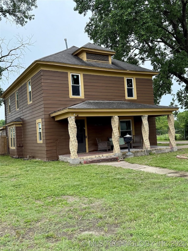 416 E 7th St, Dewey, OK 74029 - view of front of property featuring a front yard and a shingled roof