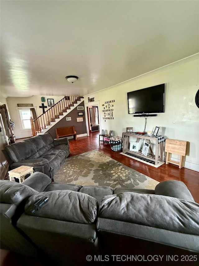 416 E 7th St, Dewey, OK 74029 - living room featuring stairs and wood finished floors