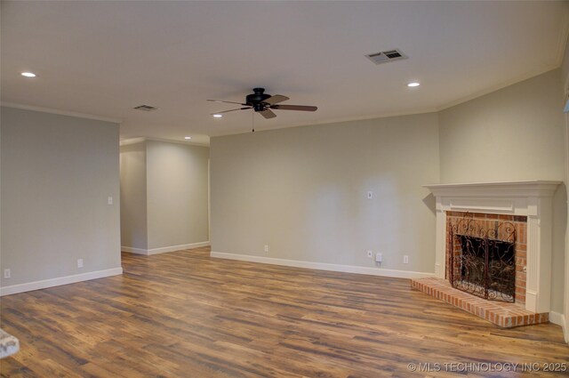 5512 S Columbia Ct, Tulsa, OK 74105 - unfurnished living room featuring recessed lighting, ornamental molding, a ceiling fan, wood finished floors, and a fireplace