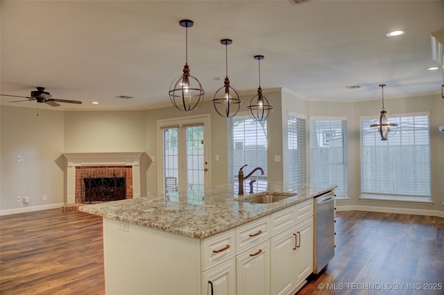 5512 S Columbia Ct, Tulsa, OK 74105 - kitchen featuring dishwasher, dark wood-style flooring, a ceiling fan, recessed lighting, and a kitchen island with sink