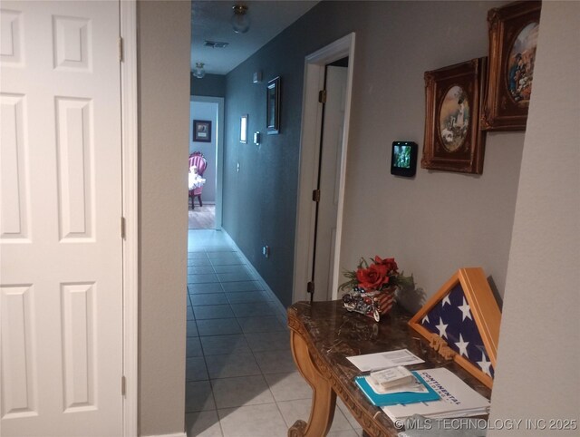 1122 Green St, Sallisaw, OK 74955 - corridor with light tile patterned floors
