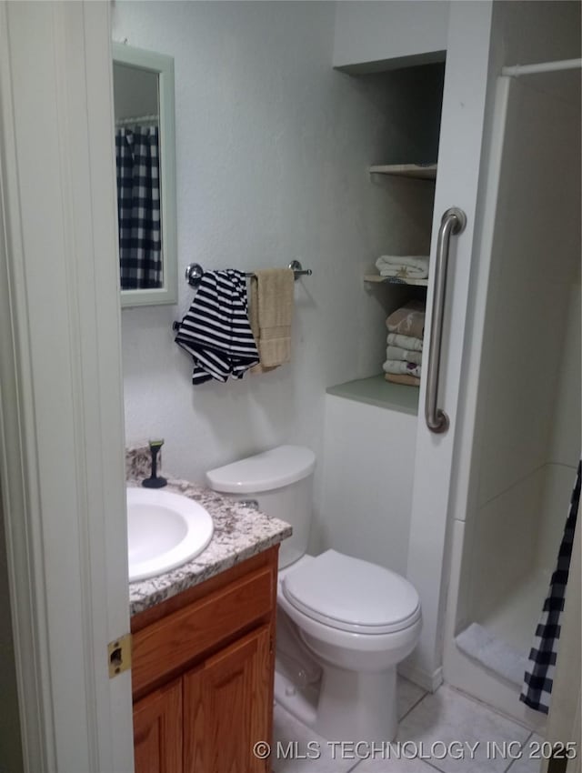 1122 Green St, Sallisaw, OK 74955 - bathroom featuring vanity, curtained shower, and tile patterned flooring