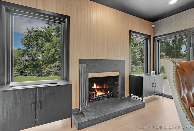2227 E 26th Pl, Tulsa, OK 74114 - detailed view of a high end fireplace and wood finished floors