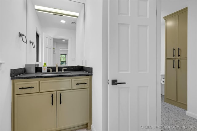 2227 E 26th Pl, Tulsa, OK 74114 - bathroom with vanity and baseboards