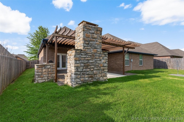 1908 E 133rd Ct, Bixby, OK 74008 - back of house with a pergola, brick siding, a fenced backyard, a chimney, and french doors