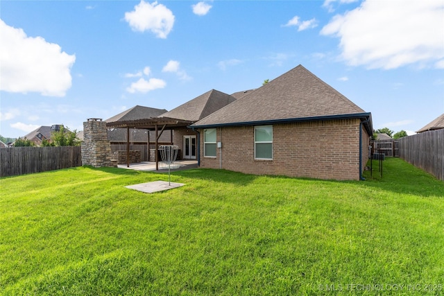 1908 E 133rd Ct, Bixby, OK 74008 - rear view of property featuring a fenced backyard, a shingled roof, a patio area, and brick siding