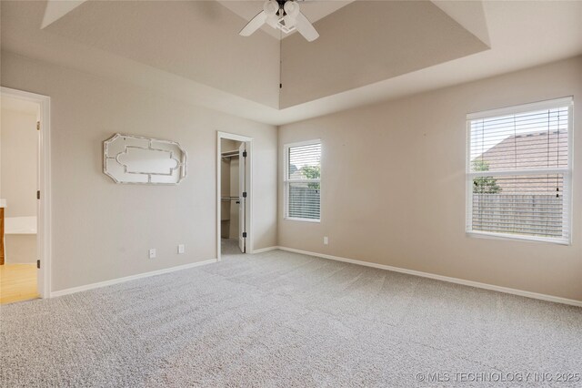 1908 E 133rd Ct, Bixby, OK 74008 - unfurnished bedroom with light colored carpet, a spacious closet, a ceiling fan, and a closet