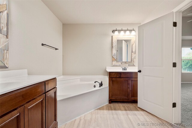 1908 E 133rd Ct, Bixby, OK 74008 - full bathroom with two vanities and a bath