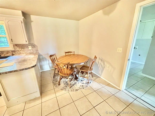 106 E Elk Rd, Whitefield, OK 74472 - dining space with light tile patterned floors