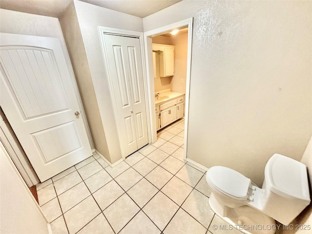 106 E Elk Rd, Whitefield, OK 74472 - bathroom with tile patterned floors and vanity