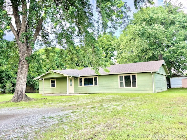 106 E Elk Rd, Whitefield, OK 74472 - single story home with a front yard and covered porch
