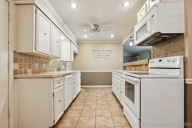 8202 S Ash Pl, Broken Arrow, OK 74011 - kitchen with white appliances, ceiling fan, backsplash, ornamental molding, and light countertops