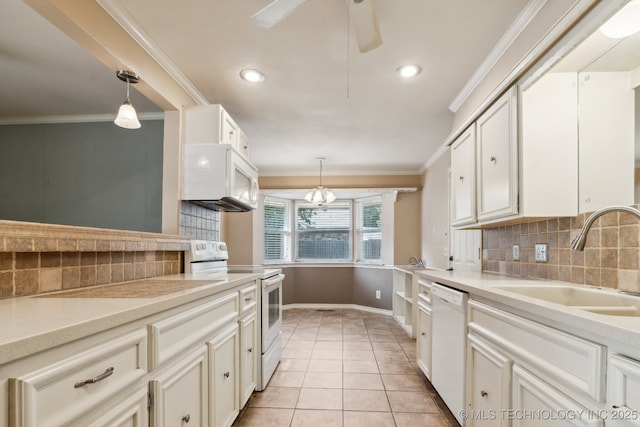 8202 S Ash Pl, Broken Arrow, OK 74011 - kitchen with white appliances, tasteful backsplash, light countertops, hanging light fixtures, and crown molding
