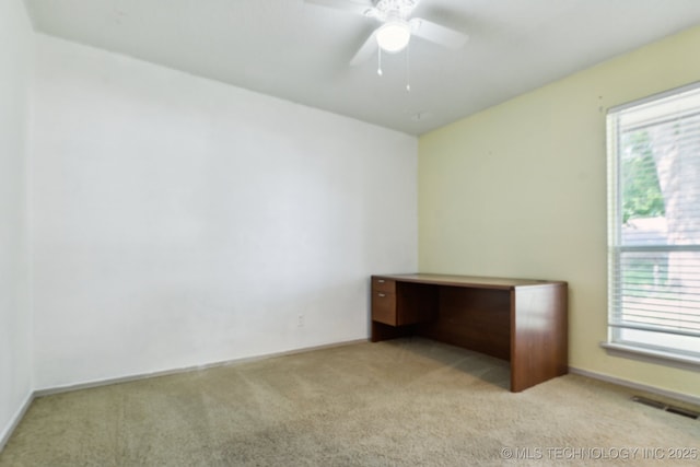 8202 S Ash Pl, Broken Arrow, OK 74011 - unfurnished bedroom with light colored carpet and multiple windows