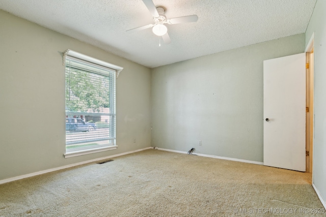 8202 S Ash Pl, Broken Arrow, OK 74011 - empty room with a ceiling fan, carpet, and a textured ceiling