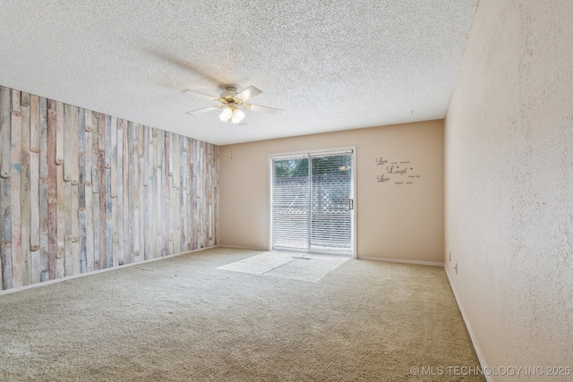 8202 S Ash Pl, Broken Arrow, OK 74011 - empty room featuring ceiling fan, carpet floors, a textured ceiling, and a textured wall