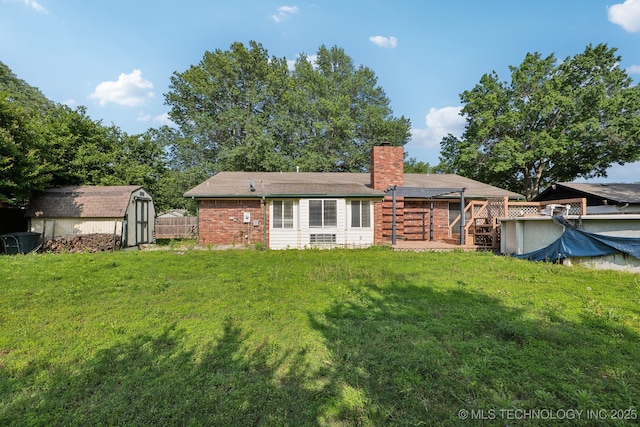 8202 S Ash Pl, Broken Arrow, OK 74011 - rear view of house featuring a storage shed and a chimney