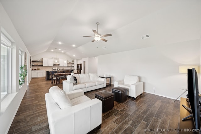 3117 W Winston St, Broken Arrow, OK 74011 - living room featuring vaulted ceiling, dark wood-type flooring, and a ceiling fan