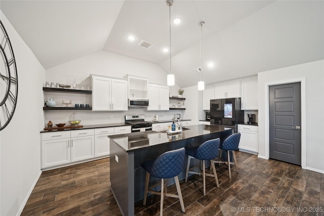 3117 W Winston St, Broken Arrow, OK 74011 - kitchen featuring open shelves, appliances with stainless steel finishes, dark countertops, lofted ceiling, and dark wood finished floors