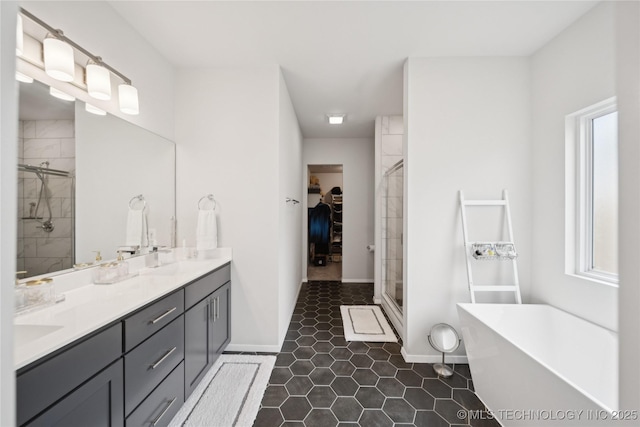 3117 W Winston St, Broken Arrow, OK 74011 - full bath featuring a soaking tub, double vanity, a stall shower, a spacious closet, and plenty of natural light