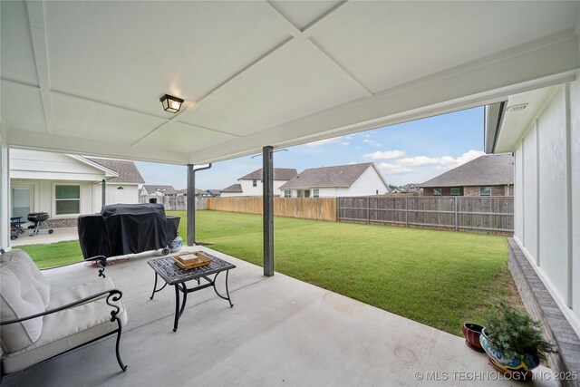3117 W Winston St, Broken Arrow, OK 74011 - fenced backyard with grilling area and a patio