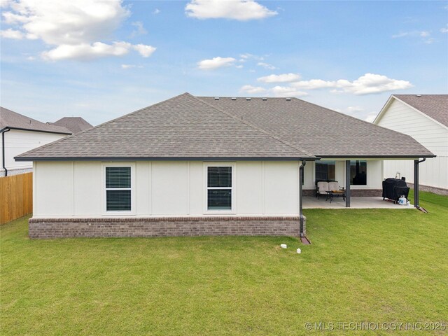 3117 W Winston St, Broken Arrow, OK 74011 - rear view of property with roof with shingles, brick siding, and a patio area