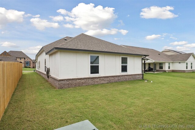 3117 W Winston St, Broken Arrow, OK 74011 - rear view of property featuring a shingled roof and brick siding