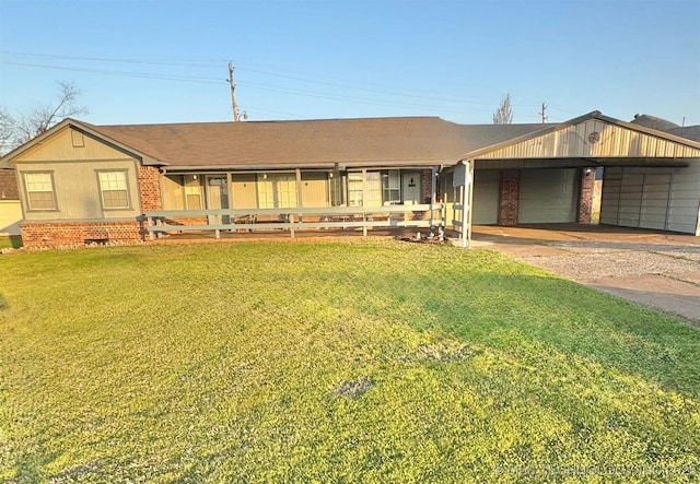 5101 S Spruce Dr, Sand Springs, OK 74063 - single story home featuring brick siding, a front lawn, and driveway