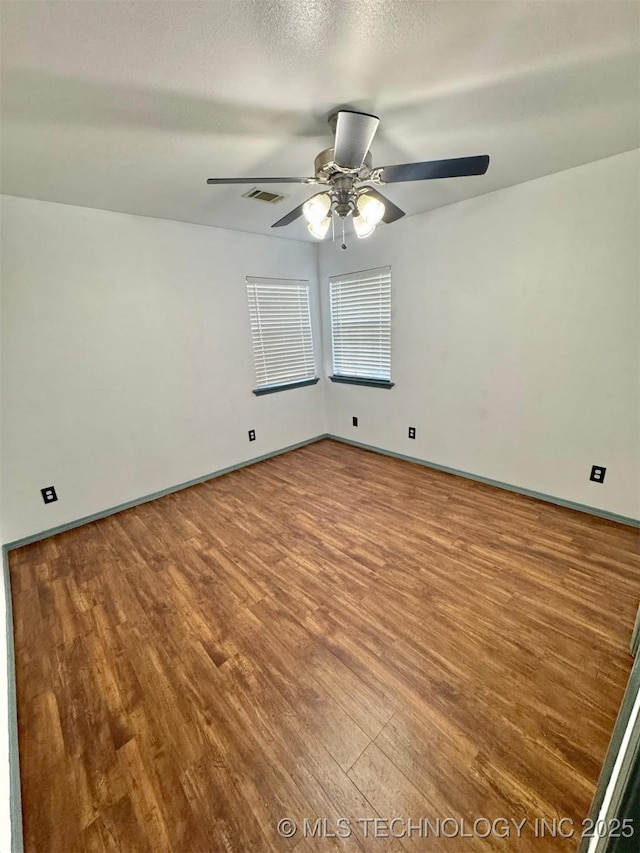 5101 S Spruce Dr, Sand Springs, OK 74063 - empty room featuring wood finished floors and ceiling fan